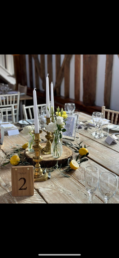 Log Slice with Antique Candle Holders and Seasonal foliage